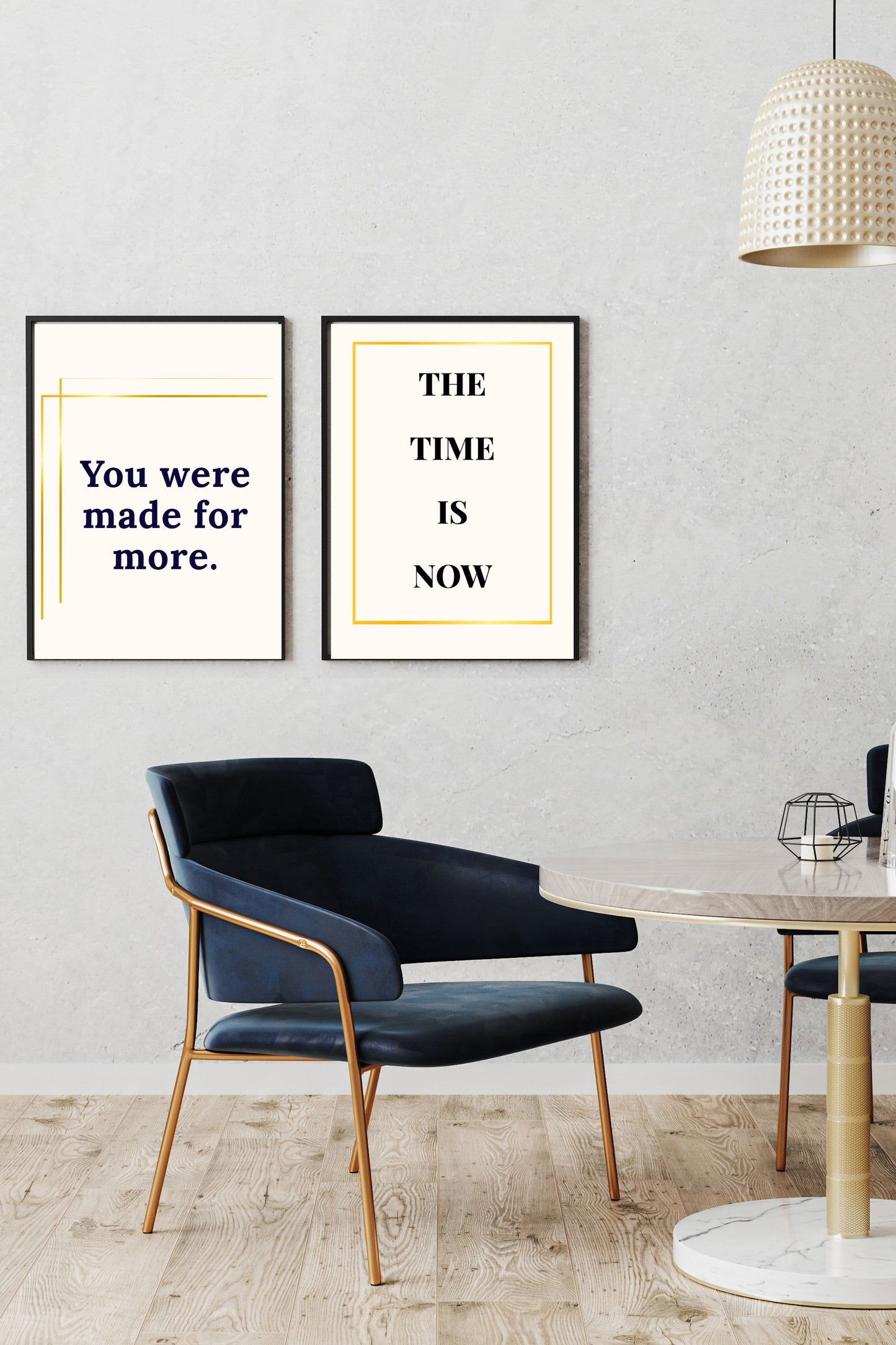 Motivational printable wall art set featuring "You were made for more." in navy text with gold accents and "THE TIME IS NOW" in bold black with a gold border, both styled in a modern dining space with navy chairs and gold details, creating an inspiring and sophisticated ambiance